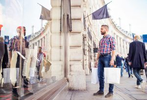 Young man shopping in the city